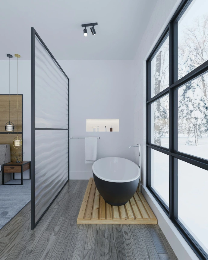 a bathroom with a tub and a sink